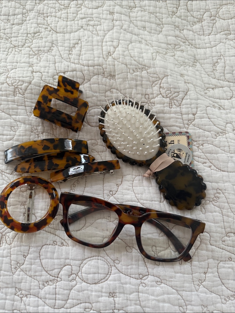 Anthropologie travel size brush, Hair Clip Set and Peepers blue-light glasses